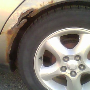 A Auto Point Collision - rusty junky loaner car - Body Shops Near Me - Rochester Hills, Michigan