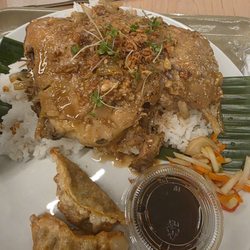 Chicken adobo meal comes with fried gyoza delicious