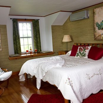 Enfield Manor - The Harriet Tubman Suite has a king bed and large attached, tiled bathroom with shower. - Bed & Breakfast Near Me - Newfield, New York