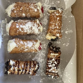Remy's Cannolis - Traditional cannolis, espresso filling with chocolate chips, chocolate drizzle, caramel drizzle - Food Delivery Services Near Me