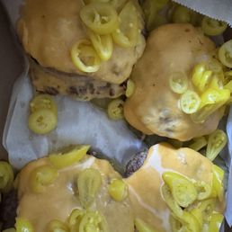 4 "Flying Dutchmen" mustard fried with whole grilled onions, yellow peppers, and pickles!
