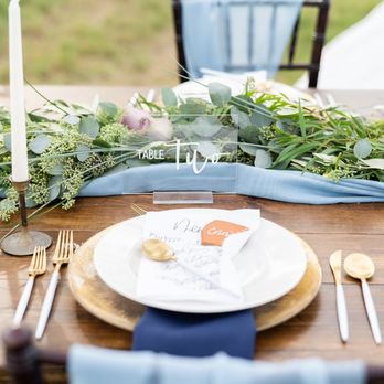 Hawaii Fine Linen Rentals - Our dark wood farm table with our Iris charger and Jacqueline flatware and dusty blue chiffon runner. - Party Equipment Rentals Near Me Hawaii Fine Linen Rentals - Our dark wood farm table with our Iris charger and Jacqueline flatware and dusty blue chiffon runner. - Party Equipment Rentals Near Me