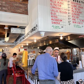 The Taco Stand - customers at the counter - Fast Food Near Me - Laguna Beach, California The Taco Stand - customers at the counter - Fast Food Near Me - Laguna Beach, California