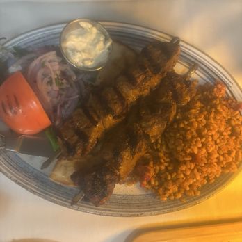 L'Olive - Lamb shiskabob with bulgar pilaf, grilled tomato, pepper and onions. - Mediterranean Near Me - Venice, Florida