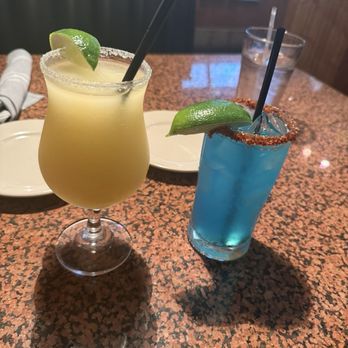 Freda's Seafood Grille - Peach margarita with sugar around the rim Blue Hawaii daiquiri - Seafood Near Me - Austin, Texas