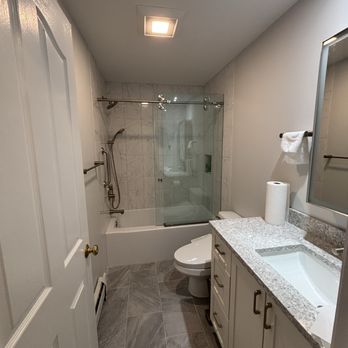 Ironwood Construction & Design - Full bathroom renovation. Tile floor and shower installed. Vanity and medicine cabinet installed. - General Contractors Near Me Ironwood Construction & Design - Full bathroom renovation. Tile floor and shower installed. Vanity and medicine cabinet installed. - General Contractors Near Me
