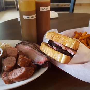 Scooter's Smokehouse BBQ - Two meat;  brisket and sausage with jalapeno potato salad and baked beans.   Sliced brisket sammy with sweet potato fries. - Barbeque Near Me - Georgetown, Colorado