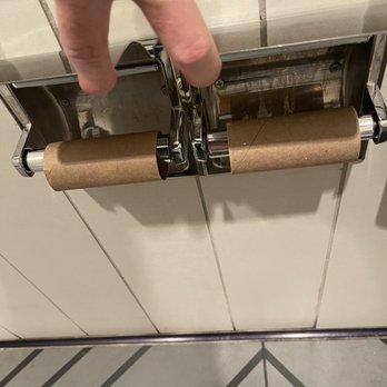 The Centurion Lounge - Sad face for no wiping allowed - Airport Lounges Near Me - Jamaica, New York