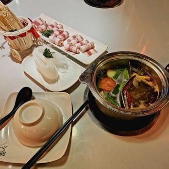 Lao Pot - Hot Pot: Signature Spicy & 3 Delicacies Soup Sliced Beef Vermicelli Noodle Enoki Mushroom  Total: $19.26 Before Tax - Hot Pot Near Me - Madison Heights, Michigan