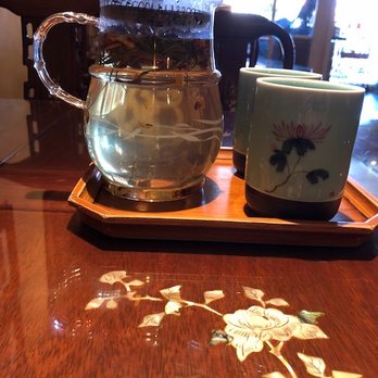 Seven Cups - Tea service for two. Table inlay in the foreground. - Tea Rooms Near Me - Tucson, Arizona