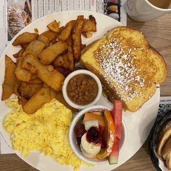 Petinos - a plate of breakfast food and a cup of coffee - Breakfast & Brunch Near Me - Dollard-des-Ormeaux, Quebec Petinos - a plate of breakfast food and a cup of coffee - Breakfast & Brunch Near Me - Dollard-des-Ormeaux, Quebec