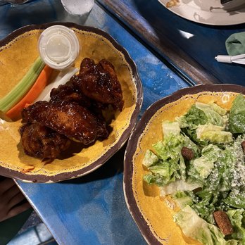 Sudi's Caribbean Bar & Grille - honey bbq wings and caesar salad - New American Near Me - St. Thomas, Virgin Islands Sudi's Caribbean Bar & Grille - honey bbq wings and caesar salad - New American Near Me - St. Thomas, Virgin Islands