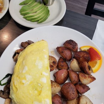 Sweet E's Cafe - Avocado and feta was suppose to be inside omelet. - Cafes Near Me - Honolulu, Hawaii Sweet E's Cafe - Avocado and feta was suppose to be inside omelet. - Cafes Near Me - Honolulu, Hawaii