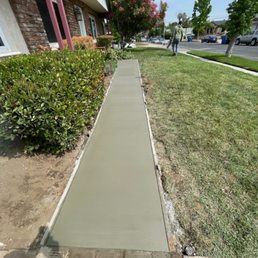 Completed concrete sidewalk. Completed concrete sidewalk.