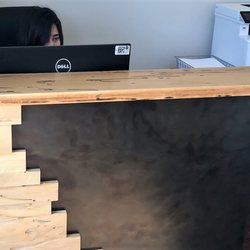 4th Edition Design - Solid wood and steel reception desk. We thrilled with the design and the final product.