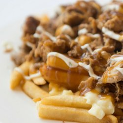 Dr Shawarma - Our delightful chicken shawarma poutine