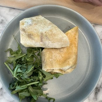Lost Property - This is the breakfast burrito from the top, comes with some arugula on the side - Cocktail Bars Near Me - Palm Springs, California