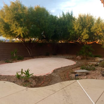 Taylormade Landscapes - End of day 1. Cleanup, pruning, removing old grass and grading begins. - Landscaping Near Me - Las Vegas, Nevada Taylormade Landscapes - End of day 1. Cleanup, pruning, removing old grass and grading begins. - Landscaping Near Me - Las Vegas, Nevada