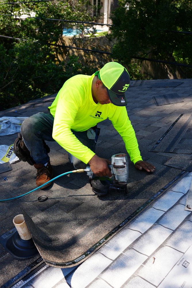 Slide of RJT Construction