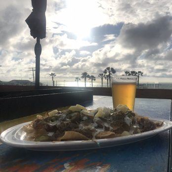 OB Brewery - Nachos, beer, and view from rooftop. - Breweries Near Me - San Diego, California OB Brewery - Nachos, beer, and view from rooftop. - Breweries Near Me - San Diego, California