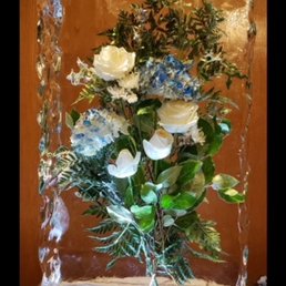 Wedding reception ice block embedded with fresh flowers Wedding reception ice block embedded with fresh flowers