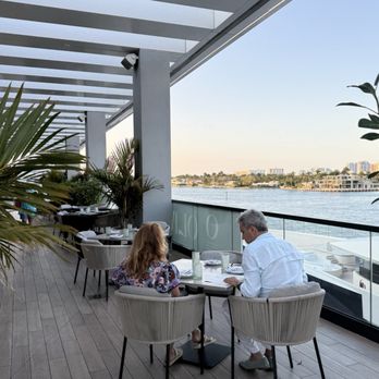 Olive & Sea - The outdoor terrace overlooking the waterway. - Mediterranean Near Me - Fort Lauderdale, Florida Olive & Sea - The outdoor terrace overlooking the waterway. - Mediterranean Near Me - Fort Lauderdale, Florida