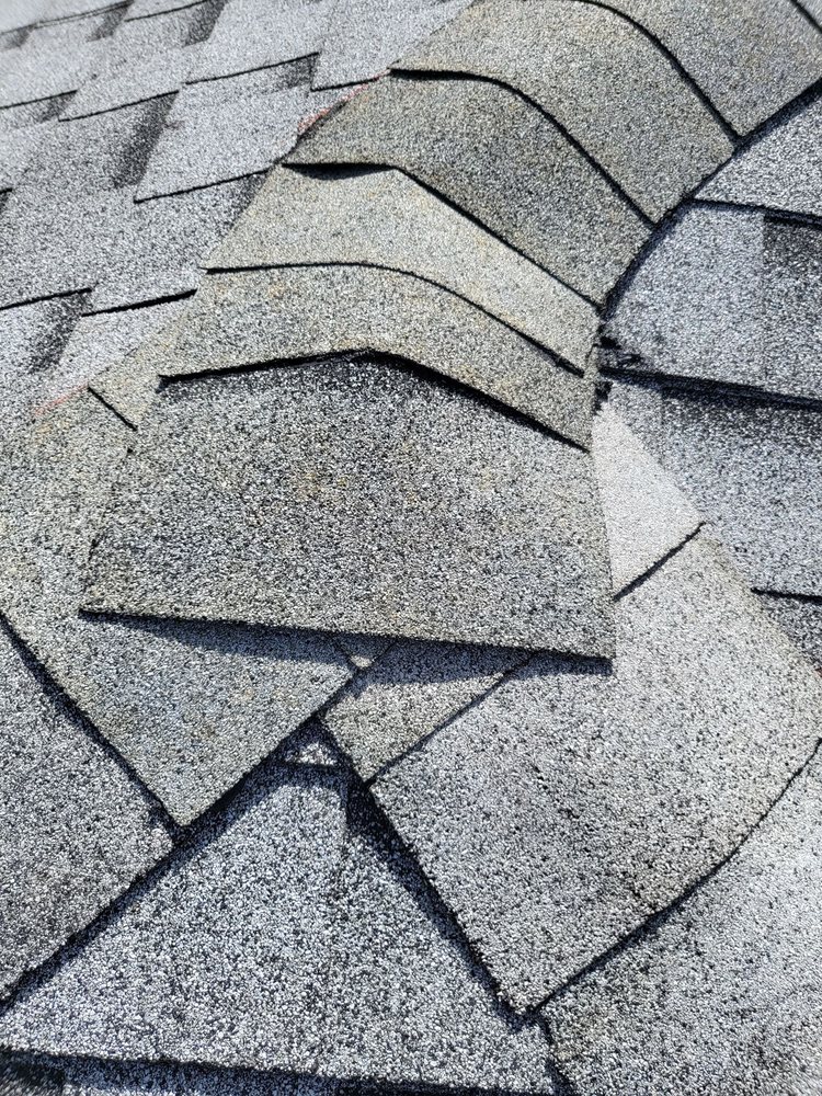 Slide of Treasure Coast Roofing