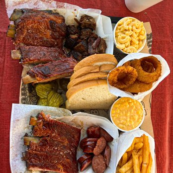 Slap's BBQ - Three ribs & sausage with cheesy corn and French fries Three ribs & burn ends with onion rings and mac and cheese - Barbeque Near Me - Kansas City, Kansas Slap's BBQ - Three ribs & sausage with cheesy corn and French fries Three ribs & burn ends with onion rings and mac and cheese - Barbeque Near Me - Kansas City, Kansas