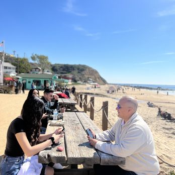 The Beachcomber - The tables outside where you can wait until your table is ready - Seafood Near Me - Newport Beach, California The Beachcomber - The tables outside where you can wait until your table is ready - Seafood Near Me - Newport Beach, California