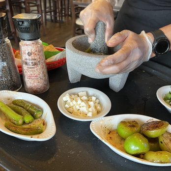 Mi Gente Taqueria - Table side tomatillo salsa - Latin American Near Me - Destin, Florida Mi Gente Taqueria - Table side tomatillo salsa - Latin American Near Me - Destin, Florida