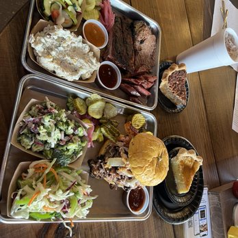 OAK'D BBQ - My sandwich is called the governor. Hubby got a 3 meat plate. Potato salad,Cole slaw, broccoli salad, cucumber salad, whiskey pie, pecan pie - Barbeque Near Me - Addison, Texas OAK'D BBQ - My sandwich is called the governor. Hubby got a 3 meat plate. Potato salad,Cole slaw, broccoli salad, cucumber salad, whiskey pie, pecan pie - Barbeque Near Me - Addison, Texas