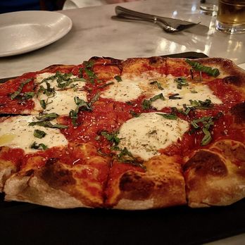 Serious Pie Downtown - Ferndale farm mozzarella, tomato sauce, & basil pizza. - Pizza Near Me - Seattle, Washington Serious Pie Downtown - Ferndale farm mozzarella, tomato sauce, & basil pizza. - Pizza Near Me - Seattle, Washington