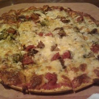 Flo & Santos - Marco's Italian Beef Pizza - shaved beef, giardiniera, caramelized onion, fire roasted tomato - Pizza Near Me - Chicago, Illinois