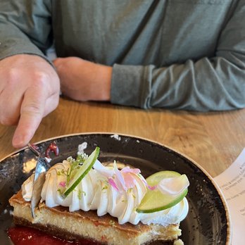 Johnston's Saltbox - Key Lime Cheesecake with a raspberry sauce - New American Near Me - San Carlos, California Johnston's Saltbox - Key Lime Cheesecake with a raspberry sauce - New American Near Me - San Carlos, California