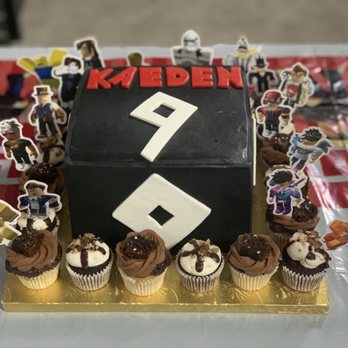 The Cupcake Shoppe - My son's Roblox cake with fondant. I put the mini cupcakes around it. - Bakeries Near Me - Hayward, California The Cupcake Shoppe - My son's Roblox cake with fondant. I put the mini cupcakes around it. - Bakeries Near Me - Hayward, California