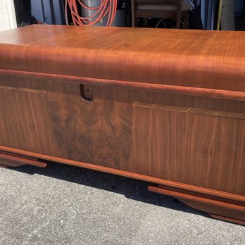 Cameo International - repaired chipped veneer and restored the color of an antique trunk, bringing back its timeless charm and beauty. - Furniture Repair Near Me Cameo International - repaired chipped veneer and restored the color of an antique trunk, bringing back its timeless charm and beauty. - Furniture Repair Near Me