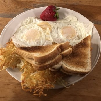 West Forty - a plate of breakfast food including toast, eggs, hash browns, and strawberries - American Near Me - Park Rapids, Minnesota West Forty - a plate of breakfast food including toast, eggs, hash browns, and strawberries - American Near Me - Park Rapids, Minnesota