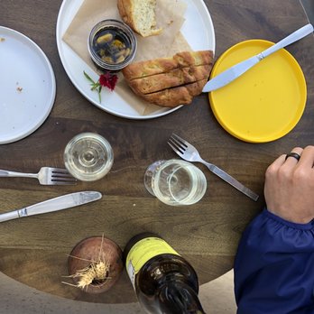 Satellite - Cast Iron Focaccia & Roasted Garlic Olive Oil - Cast Iron Focaccia & Roasted Garlic Olive Oil , kombucha - Wine Bars Near Me - Santa Barbara, California Satellite - Cast Iron Focaccia & Roasted Garlic Olive Oil - Cast Iron Focaccia & Roasted Garlic Olive Oil , kombucha - Wine Bars Near Me - Santa Barbara, California