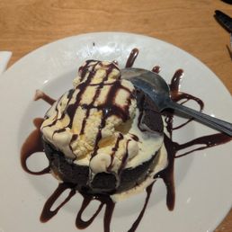 Chocolate oozing brownie with vanilla a la mode!! Chocolate oozing brownie with vanilla a la mode!!