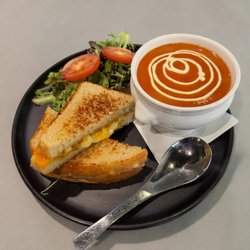 Mon Paris Coffee Shop & Bakery - Our homemade tomato soup and golden, melty grilled cheese are ready for you. Stop by Mon Paris for a little lunchtime comfort.