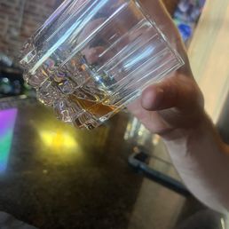 House smoked bbq bourbon from The Attic. A taster from the bartender, Jared. Delicious!