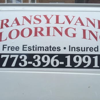 Transylvania Flooring - a van parked in front of a building - Flooring Near Me - Skokie, Illinois Transylvania Flooring - a van parked in front of a building - Flooring Near Me - Skokie, Illinois