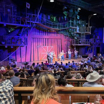 Hatfield & McCoy Dinner Feud - a stage with people sitting and standing - Performing Arts Near Me - Pigeon Forge, Tennessee Hatfield & McCoy Dinner Feud - a stage with people sitting and standing - Performing Arts Near Me - Pigeon Forge, Tennessee