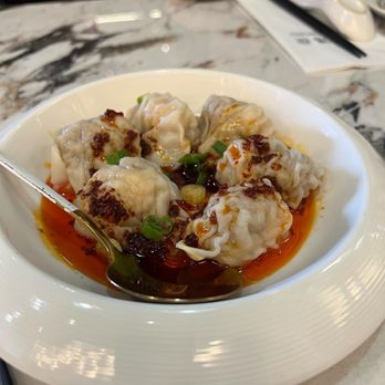 Supreme Dumplings - Szechuan Spicy Xiao Long Bao (8) Szechuan Spicy Xiao Long Bao (8) - Shanghainese Near Me - Bellevue, Washington