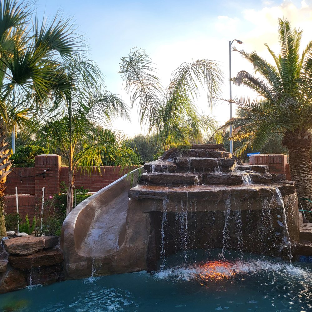 Eckel Pool Concepts - Grotto and slide - Pool & Hot Tub Service Near Me - Missouri City, Texas Eckel Pool Concepts - Grotto and slide - Pool & Hot Tub Service Near Me - Missouri City, Texas
