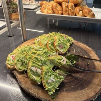 American Express Centurion Lounge - Avocado toast and croissants during breakfast - Airport Lounges Near Me - Los Angeles, California
