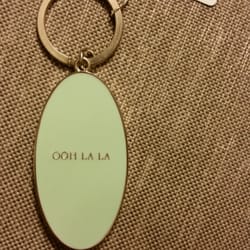 On a Whim Gift Boutique - Backside of keychain. It is large quite heavy. I don't have a ruler/ tape measure but will update it in a few days