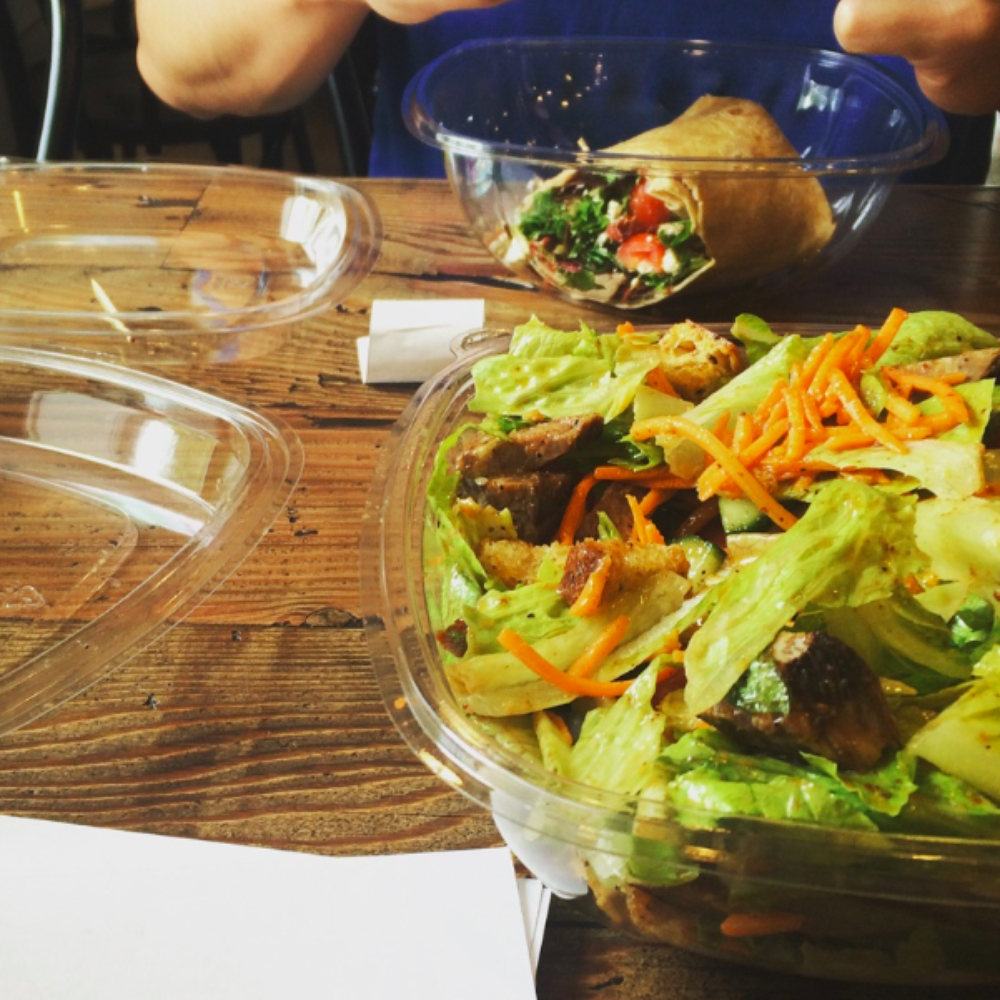 Greenline - a salad in a bowl and a salad in a bowl on a table - Salad Near Me - Oxford, Mississippi