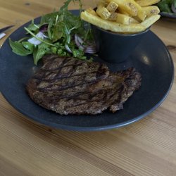 The Boat Inn - Scottish ribeye plate with French fries and a small salad