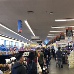 The line of people goes across the entire store